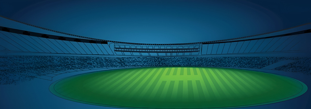 Lush green cricket ground with players